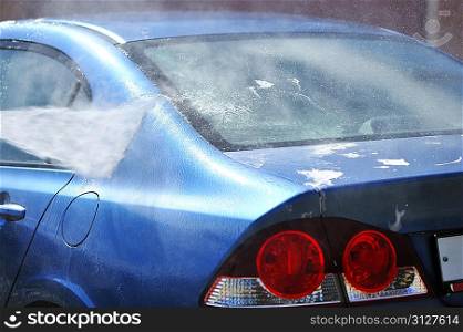 Blue car washing on open air