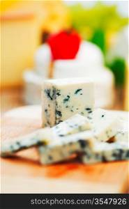 Blue cheese on wood plate