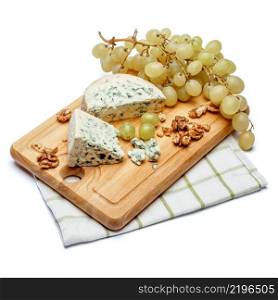 blue cheese on wooden cutting board. White background. blue cheese on wooden cutting board