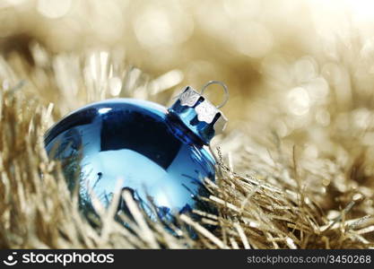 blue christmas ball on golden background