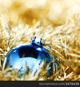 blue christmas ball on golden background