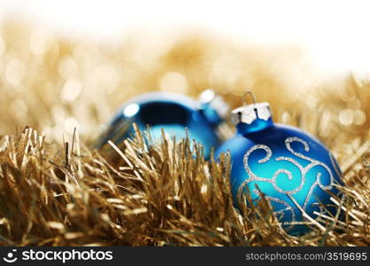 blue christmas ball on golden background