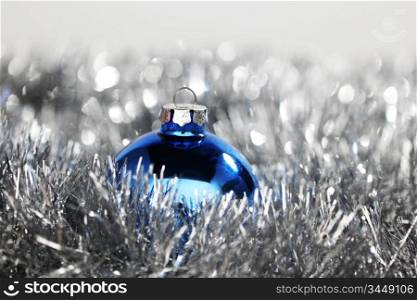 blue christmas ball on silver background