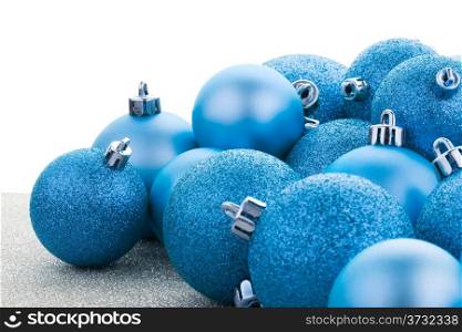Blue christmas balls background.