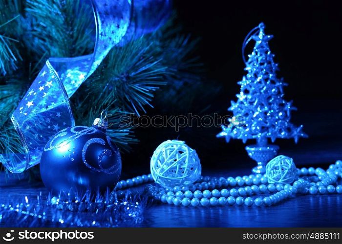 Blue Christmas collage. Blue Christmas collage. Ball and ribbon on a blue background.