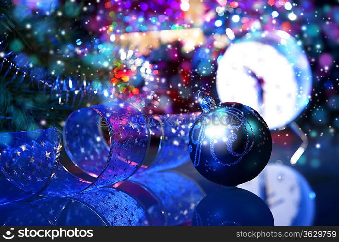 Blue Christmas collage. Decorations and ribbons on a blue background