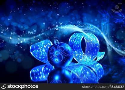 Blue Christmas collage. Decorations and ribbons on a blue background