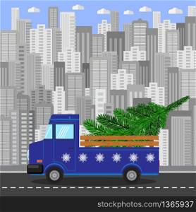 Blue Christmas Truck with Green Fir on Grey City Building Background.. Blue Christmas Truck with Green Fir on Grey City Building Background