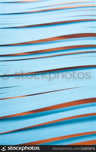 Blue cit paper strips background. Simple color paper background in blue and red.