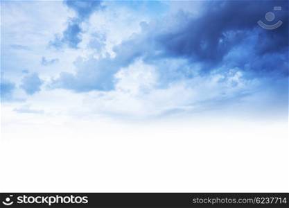 Blue cloudy sky border, soft fluffy clouds, good weather, beautiful peaceful landscape, natural background with white text space