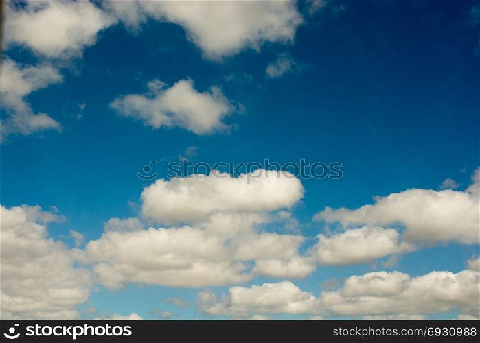 Blue cloudy sky with white clouds