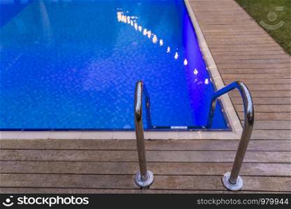 blue color pool , poolside handle wood