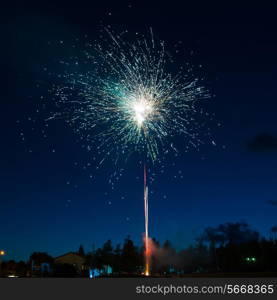 Blue colorful fireworks on night sky background