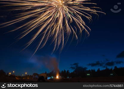 Blue colorful fireworks on night sky background