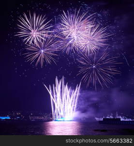 Blue colorful fireworks on the black sky background