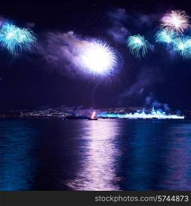 Blue colorful fireworks on the black sky background