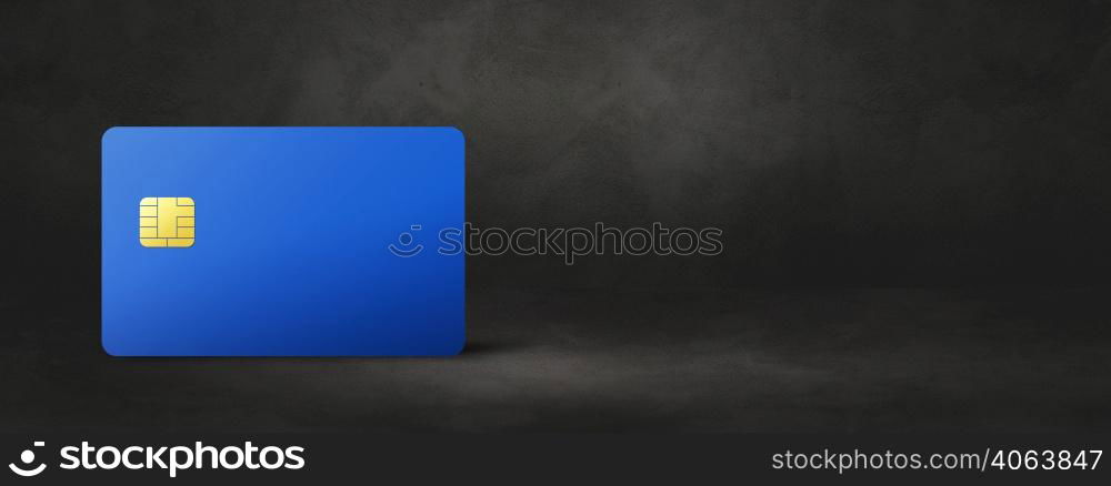 Blue credit card template on a black concrete background banner. 3D illustration. Blue credit card on a black concrete background