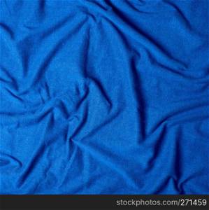 blue crumpled cotton stretching soft fabric, full frame