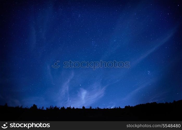 Blue dark night sky with many stars. Space background
