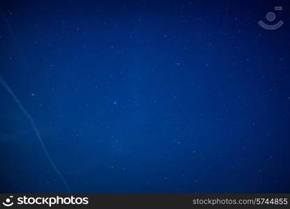 Blue dark night sky with many stars. Space background