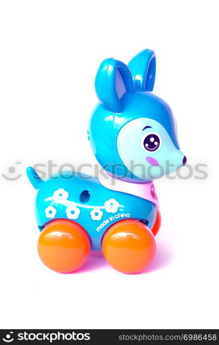 blue deer wind up toy plastic on isolated white background