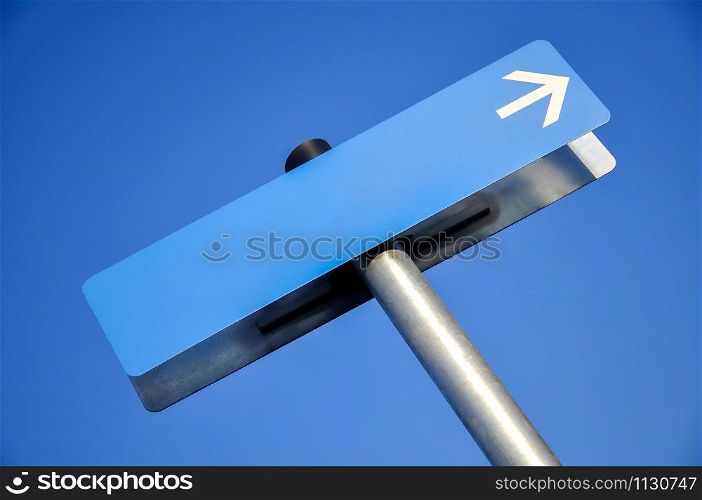 Blue direction sign with empty copy-paste space for text