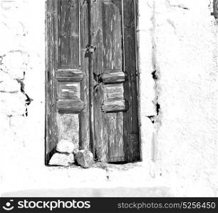 blue door in antique village santorini greece europe and white wall
