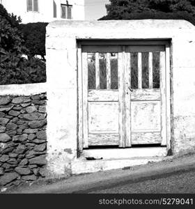 blue door in antique village santorini greece europe and white wall