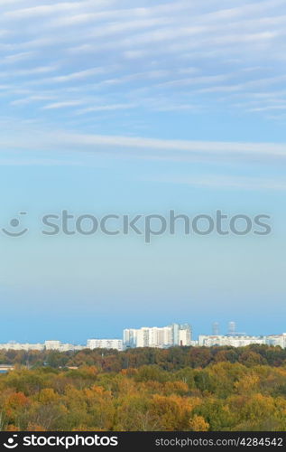 blue evening sky over city in autumn