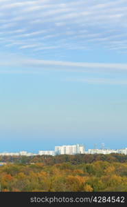 blue evening sky over city in autumn