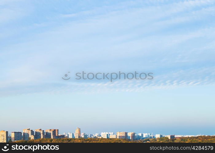 blue evening sky over residential district in autumn