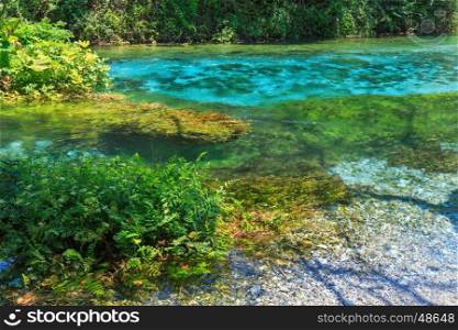 Blue Eye (water spring) with clear blue water summer view (near Muzine in Vlore County, Albania).