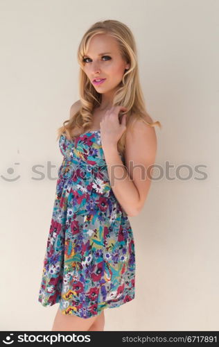 Blue eyed California blonde in a summer dress