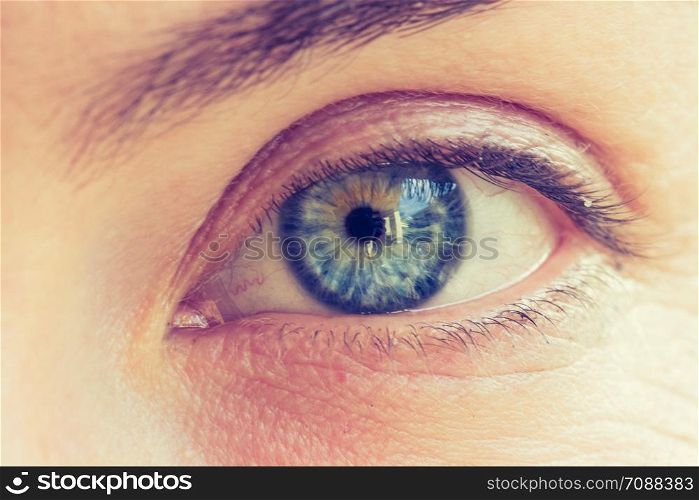 Blue eyed girl: Close up of beautiful white eyes