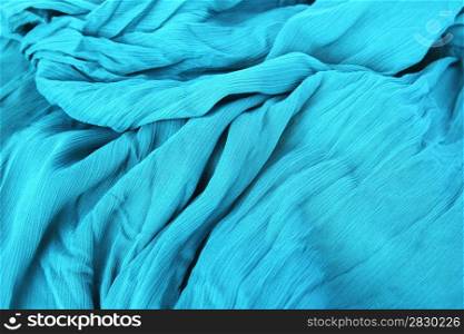 Blue fabric as a background.