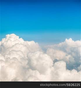 Blue fluffy clouds and sky. Natural background
