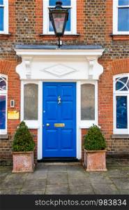 Blue front door of Georgian style house in Beaconsfield, Buckinghamshire, England