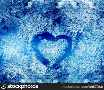 Blue frost winter background with white snowflakes