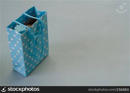 Blue Gift box is on the light blue background,copy space,