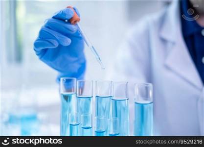 Blue glass test tube glassware liquid s&le pipette equipment in chemical chemistry biotechnology laboratory science research analysis experiment test industry, scientific pharmaceutical medical