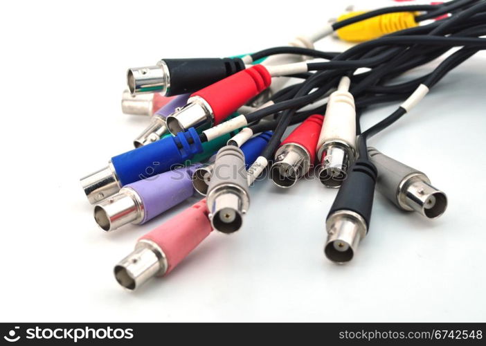 Blue, green, yellow, white, RCA, cables and plugs isolated on white