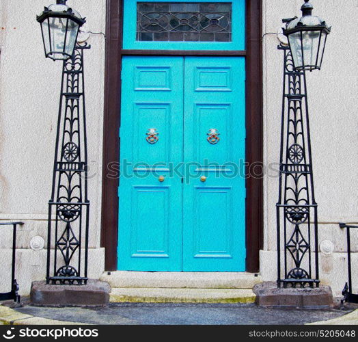 blue handle in london antique door rusty brass nail and light