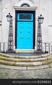 blue handle in london antique door rusty brass nail and light