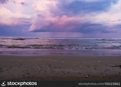 Blue hour on a stormy day at McKenzie beach, Larnaca, island of Cyprus