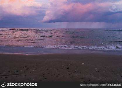 Blue hour on a stormy day at McKenzie beach, Larnaca, island of Cyprus