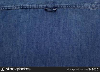 Blue jeans denim background texture. Jeans fabric as material surface