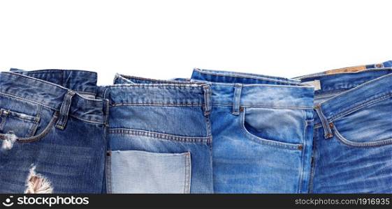 Blue jeans denim with pocket isolated on white background. Jeans heap