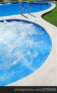 blue jet spa pool in green grass garden outdoor dayspa