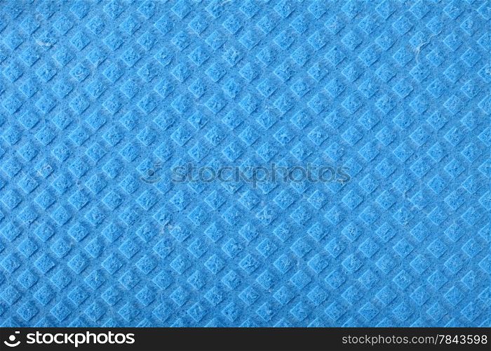 Blue kitchen sponge rubber foam as background texture