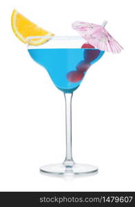 Blue lagoon summer cocktail in margarita glass with orange slice and sweet cherry with umbrella on white background.